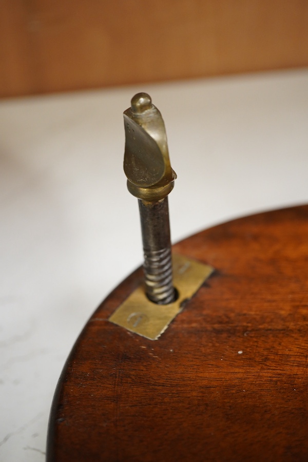 An Edwardian mahogany and brass racket press, 37cm wide